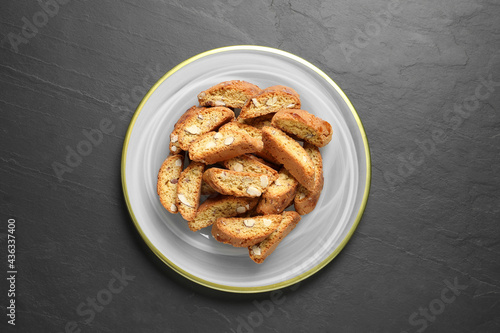 Traditional Italian almond biscuits (Cantucci) on grey table, top view