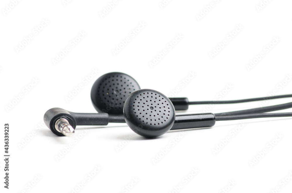 Earphone for music player and smartphone on white background Earphone for music player and smartphone on white background