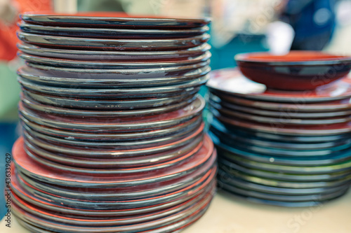 stack of colorful plates