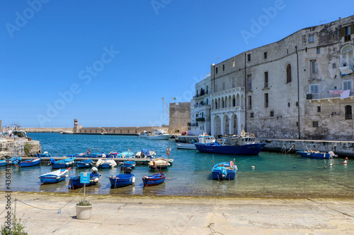 Obraz na plátně Boats moored at the Porto Antico in the old town of Monopoli, Puglia, Italy