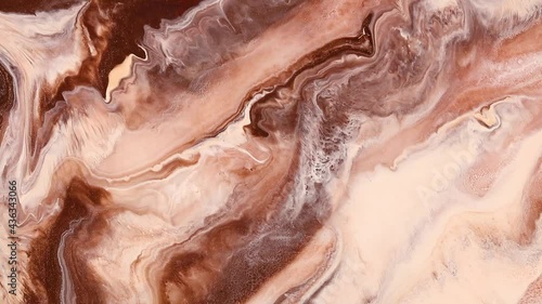 Fluid art drawing footage, trendy acryl texture with colorful waves. Liquid paint mixing backdrop with splash and swirl. Detailed background motion with brown, beige and caramel overflowing colors.