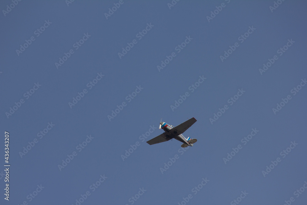 old plane on blue sky background old plane on blue sky background