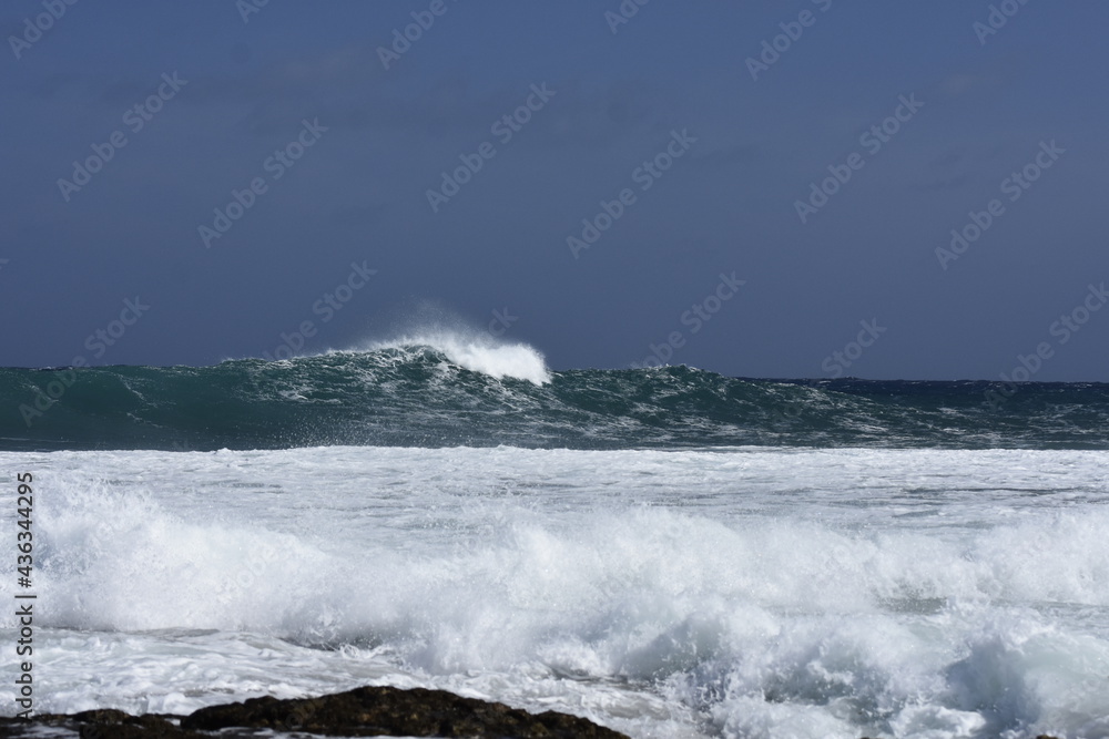 the waves of the sea demonstrate their power