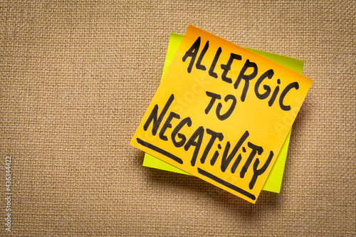 allergic to negativity - handwriting on a sticky note, positivity concept photo