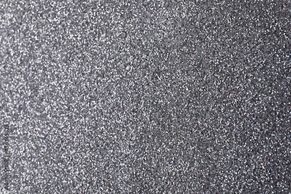 Beautiful shiny grey glitter as background, closeup