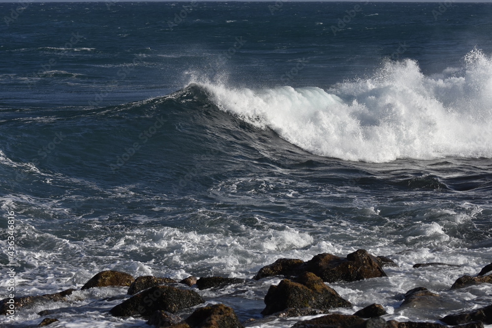 the waves of the sea demonstrate their power