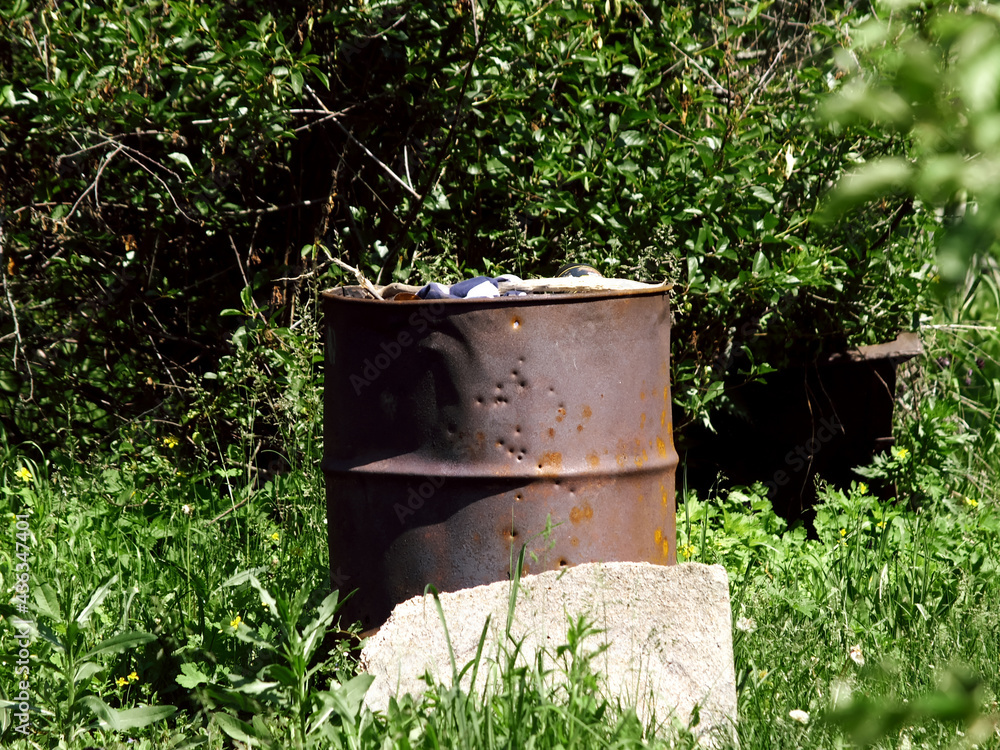 iron barrel for burning garbage in the garden iron barrel for burning garbage in the garden