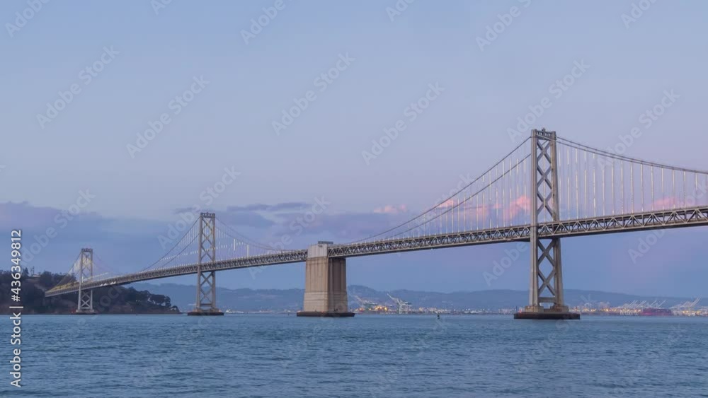 Sunset to night time lapse of the San Francisco Oakland Bay Bridge Sunset to night time lapse of the San Francisco Oakland Bay Bridge