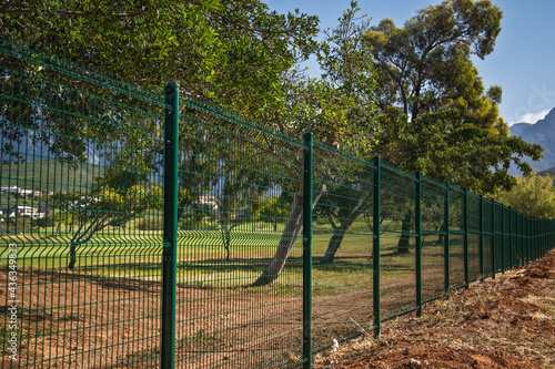 fence protoecting a golf course