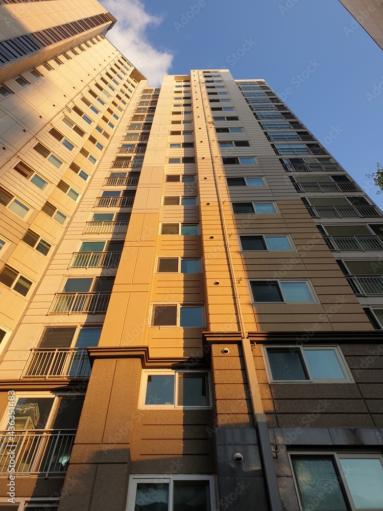 Sky Apartment with windows in sunset time Sky Apartment with windows in sunset time