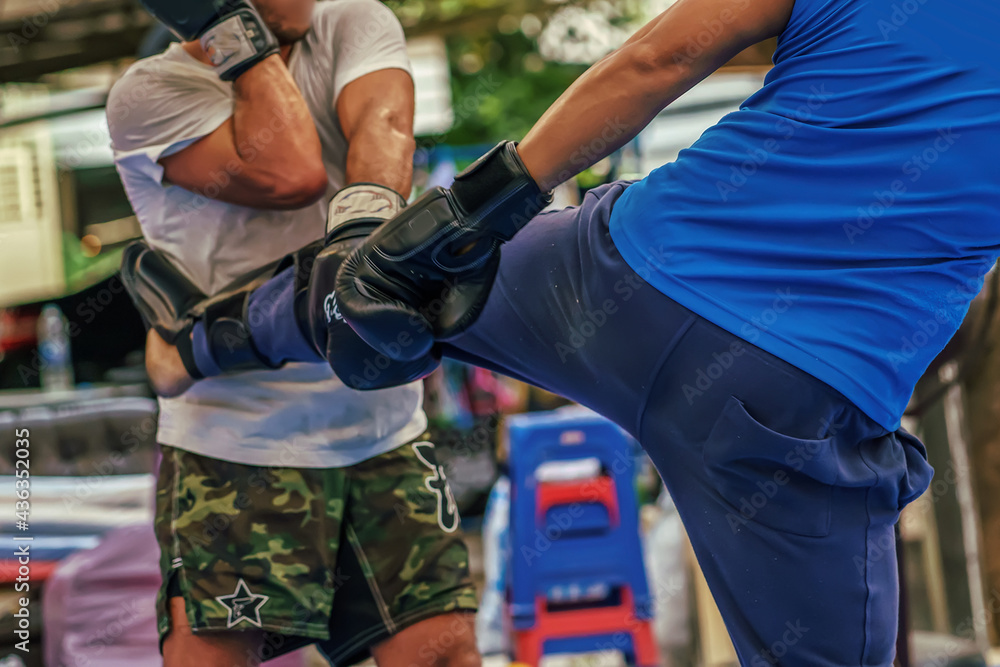 Sparring thai boxing in a boxing stadium. Sparring thai boxing in a boxing stadium.
