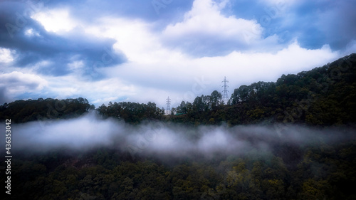 Hill station covered with mist and clouds