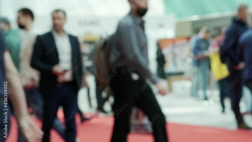 People walk past the camera. People walk past the camera.