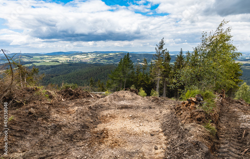 Long mountain trail in Walbrzych mountains with beautiful panorama of mountains