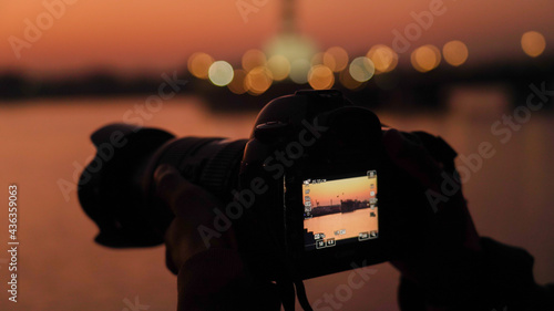 Photography Silhouette of a camera capturing the sunset