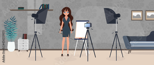 The girl is giving a presentation in front of the camera. The teacher conducts a lesson online.