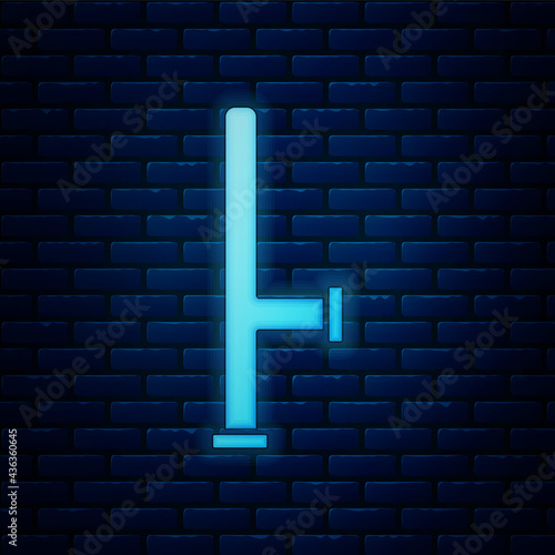 Glowing neon Police rubber baton icon isolated on brick wall background. Rubber truncheon. Police Bat. Police equipment. Vector photo