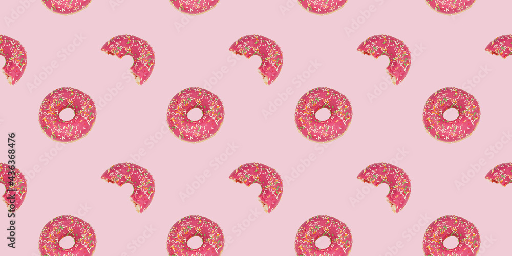 A seamless repeating pattern of a glamorous pink donut. Bright rose background with a bitten and whole doughnut. A seamless repeating pattern of a glamorous pink donut. Bright rose background with a bitten and whole doughnut.