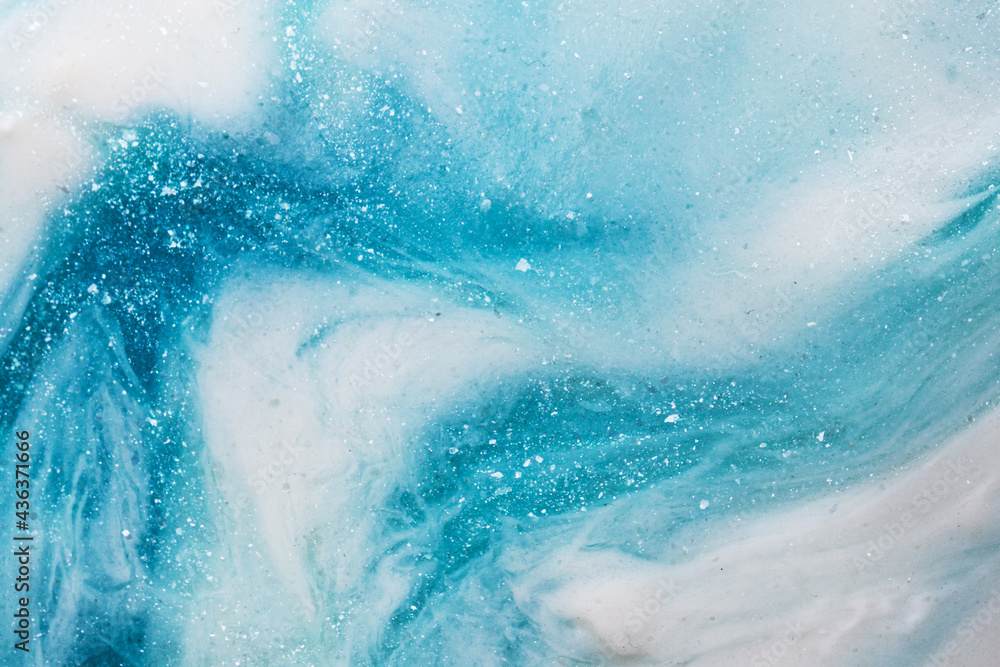 Fototapeta premium Liquid art gel blue gradient background with glitter. Slime toy. Abstract blue white surface. 