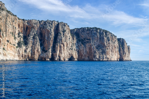 Rock in the sea. Scenic landscape of rocky coastline in Sardinia, Italy. 