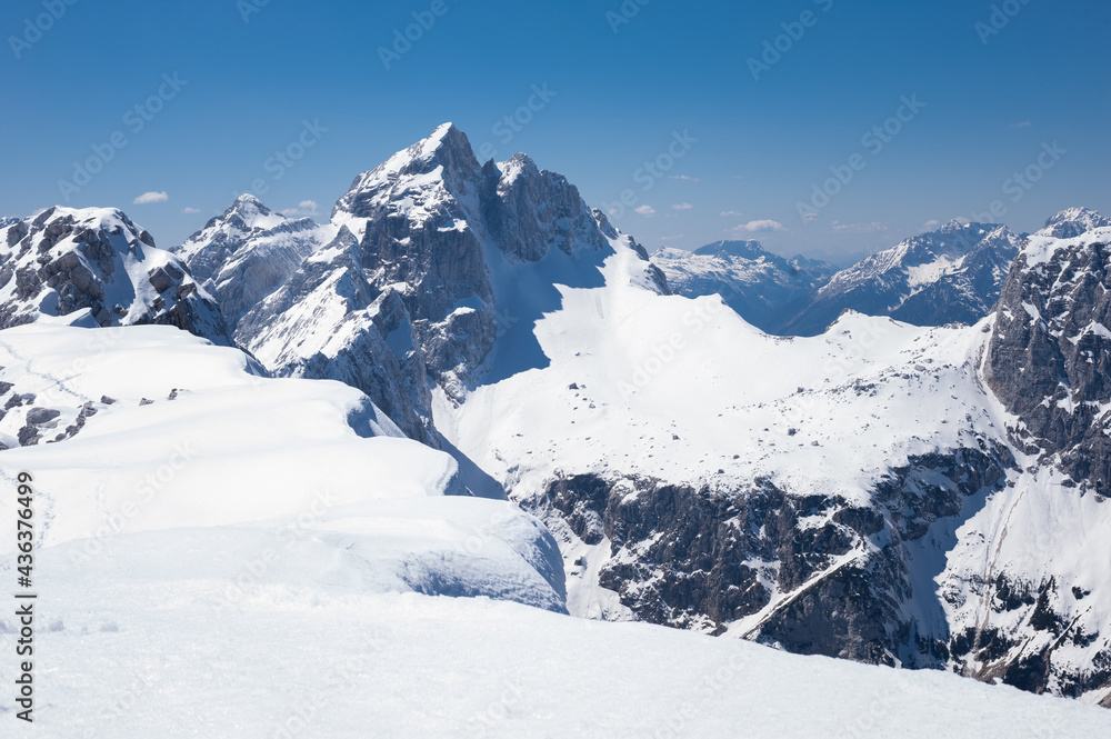 severe view of spring still snowy slovenian alps Mala Mojstrovka