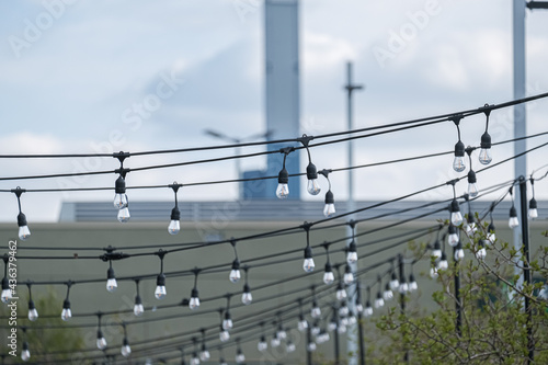 String of Electric Bulbs strung over restaurant outdoor patio