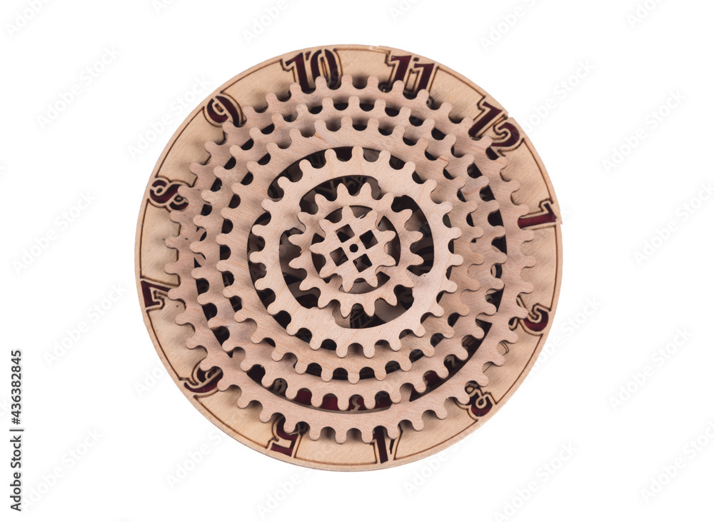 Fototapeta premium wooden clock gears isolated on white background