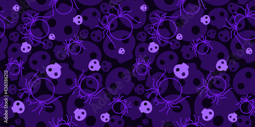 Halloween vector seamless pattern. Spooky spiders and skulls on dark violet background. Scary texture for paper, textile, posters and web. 