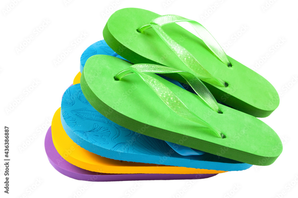 multi-colored rubber beach flip flops on a white background multi-colored rubber beach flip flops on a white background