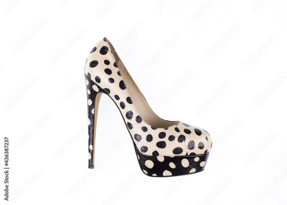 Fototapeta premium stylish vintage black and white high-heeled shoes isolated on white background