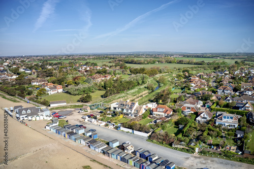 Cuadro en lienzo Ferring seafront on the English Channel with the Ferring Rife running next to the village of Ferring in West Sussex and towards the Beach Huts and coastline