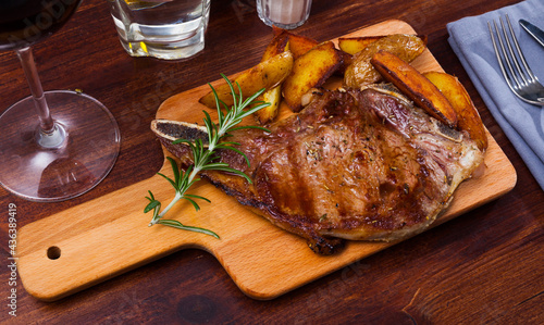 Appetizing beef steak with potatoes and rosemary. High quality photo