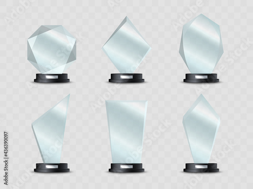 Glass trophies. Realistic crystal awards or acrylic prizes. Winner glass cups on stand. Vector illustration.