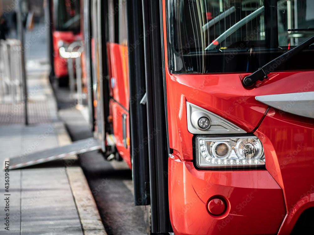 Ταπετσαρία Red bus in the street. The wheelchair access is unfolded.