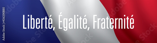 Flag of France with Liberte, egalite, fraternite patriotic motto. photo