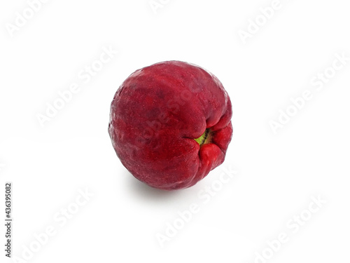Red Raw Water Apple On White Background. Tropical fruit, crunchy, juicy, sweet and refresing from Martinique. Close up of Fresh ripe water apple, rose apple, water guava. Healthy food and fruit. photo