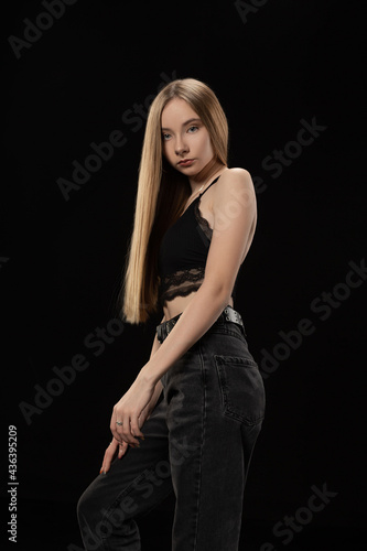  Studio, black background, top and jeans +