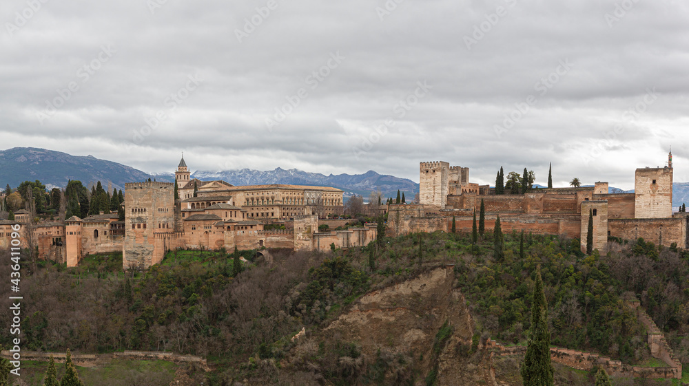 Panoramic view of the Alhambra in Granada, in the background Sierra Nevada, Spain