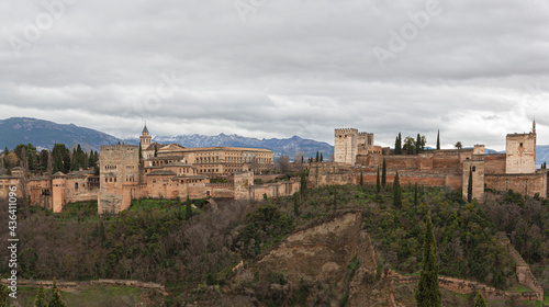 Panoramic view of the Alhambra in Granada, in the background Sierra Nevada, Spain