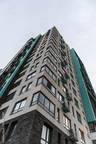 Wallpaper Mural Facades of modern multi-storey buildings in Moscow. In New Moscow, we photograph houses from the bottom up. Torontodigital.ca