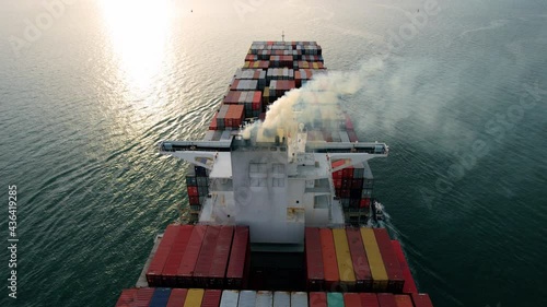Smoke exhaust gas emissions carbondioxide from cargo lagre ship container ship,Marine diesel engine exhaust gas from combustion, Gas Emission Air Pollution from transportation. green house effect Eco.