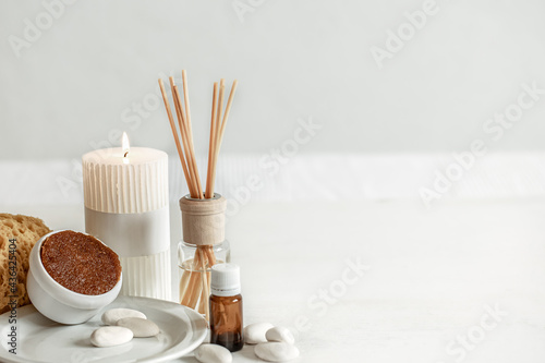 Photography Spa composition with aroma sticks, aroma oil and scrub copy space