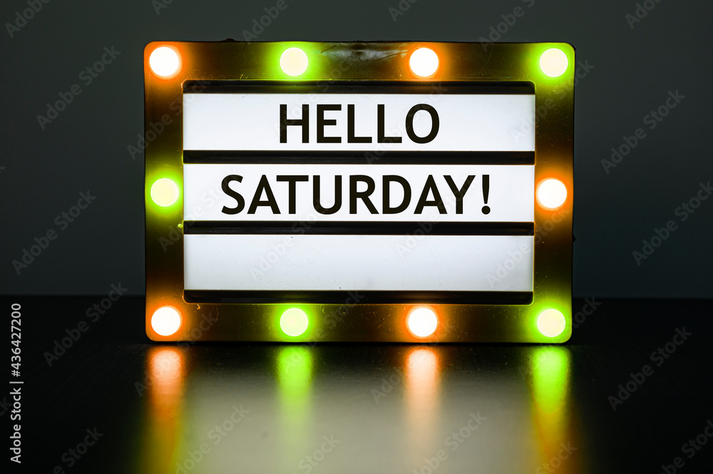 Lightbox with yellow and orange lights in dark room with words Hello