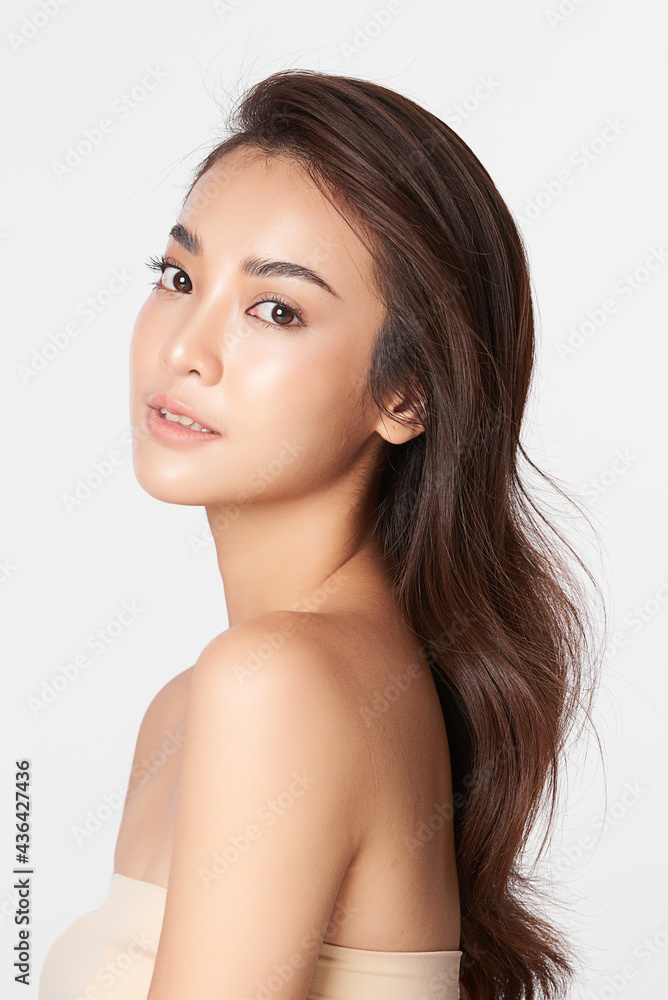 Beautiful young asian woman with clean fresh skin on white background, Face care, Facial treatment, Cosmetology, beauty and spa, Asian women portrait Beautiful young asian woman with clean fresh skin on white background, Face care, Facial treatment, Cosmetology, beauty and spa, Asian women portrait