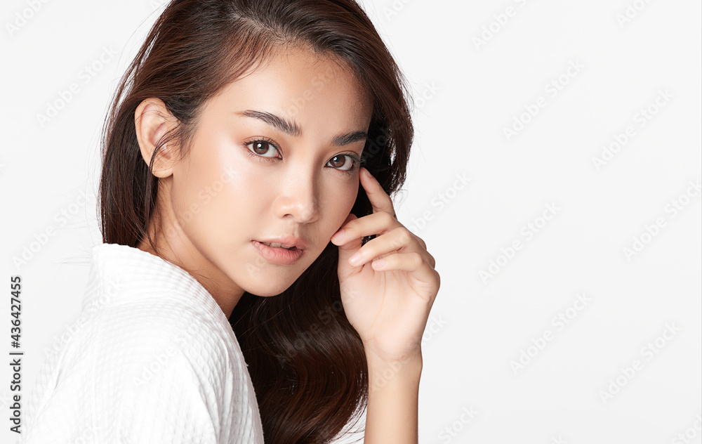 Beautiful young asian woman with clean fresh skin on white background, Face care, Facial treatment, Cosmetology, beauty and spa, Asian women portrait Beautiful young asian woman with clean fresh skin on white background, Face care, Facial treatment, Cosmetology, beauty and spa, Asian women portrait