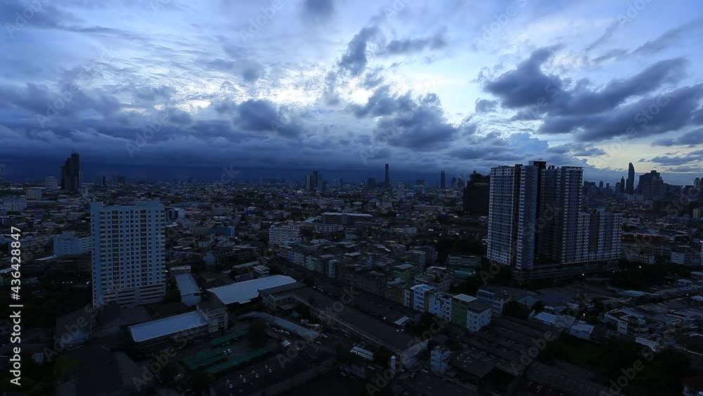 The high angle background of the city view with the secret light of the evening, blurring of night lights, showing the distribution of condominiums, dense homes in the capital community The high angle background of the city view with the secret light of the evening, blurring of night lights, showing the distribution of condominiums, dense homes in the capital community