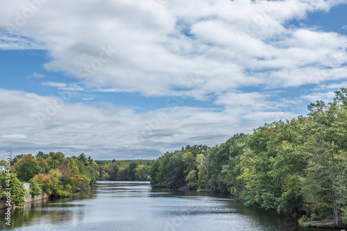 James River at Wilbraham with trees and soft cloudy blue sky