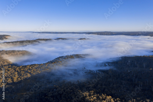 Drone aerial photograph of fog in a large valley in regional Australia