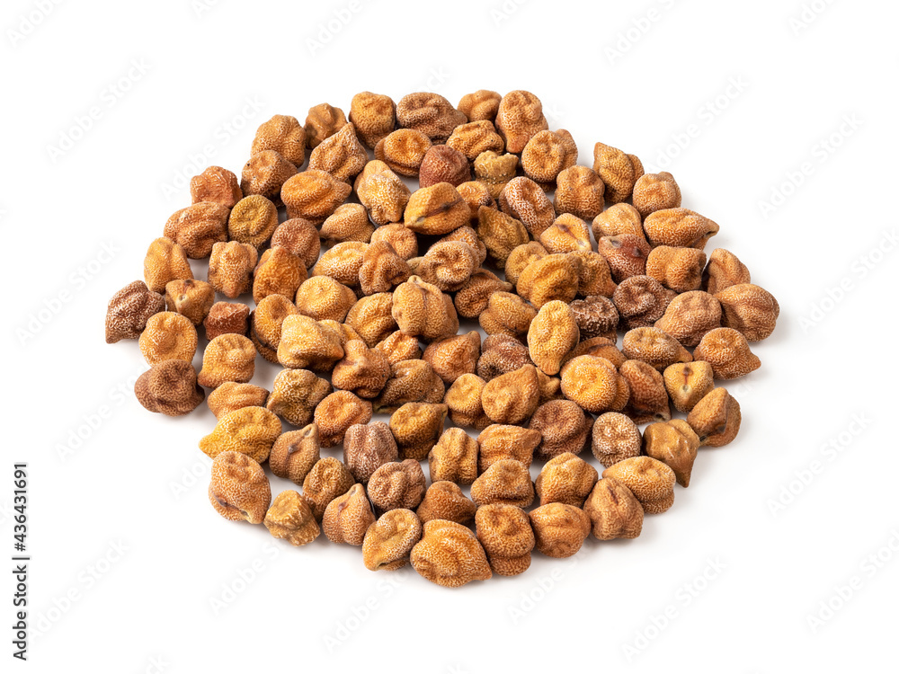 pile of raw black chickpeas closeup on white pile of raw black chickpeas closeup on white