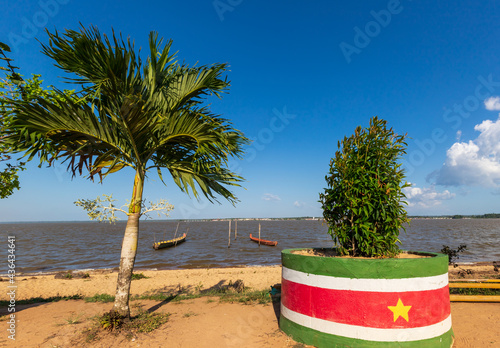 Albina, Suriname - September 2020: Flag Of Suriname Painted On Plant Pot At The French Guiana Border. photo